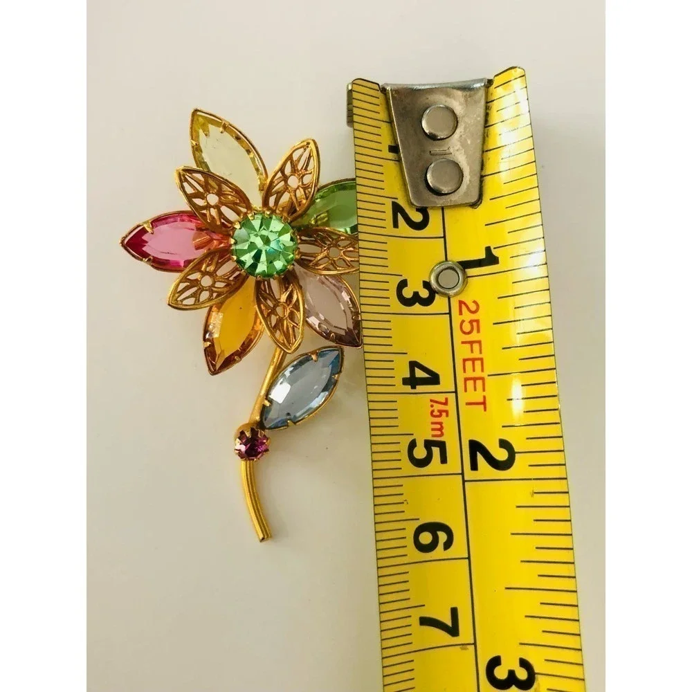 Flower gold-tone brooch with multicolor rhinestones